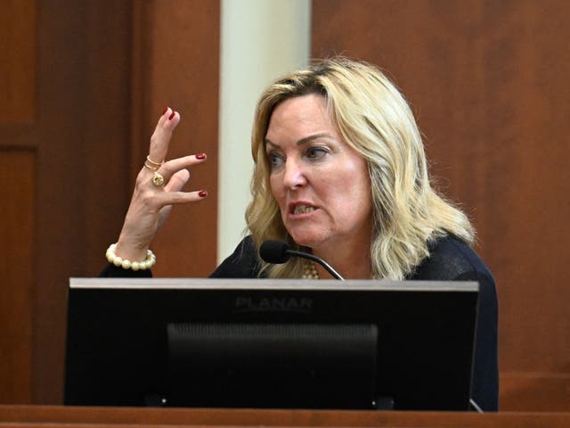 <p>Forensic psychologist Dr. Dawn Hughes, testifies during a hearing at the Fairfax County Circuit Courthouse in Fairfax, Virginia, on May 3, 2022</p>