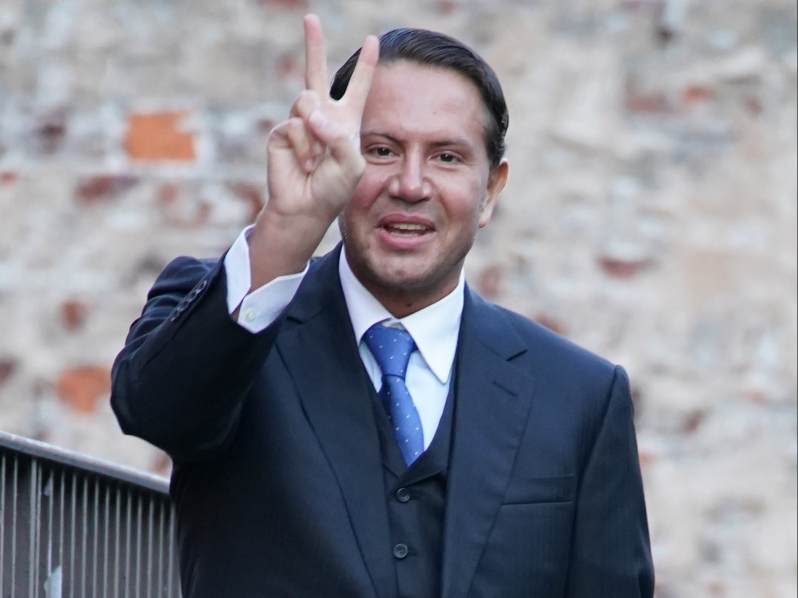Socialite James Stunt makes a hand gesture as he arrives at Leeds Crown Court on 5 January