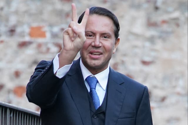 <p>Socialite James Stunt makes a hand gesture as he arrives at Leeds Crown Court on 5 January</p>
