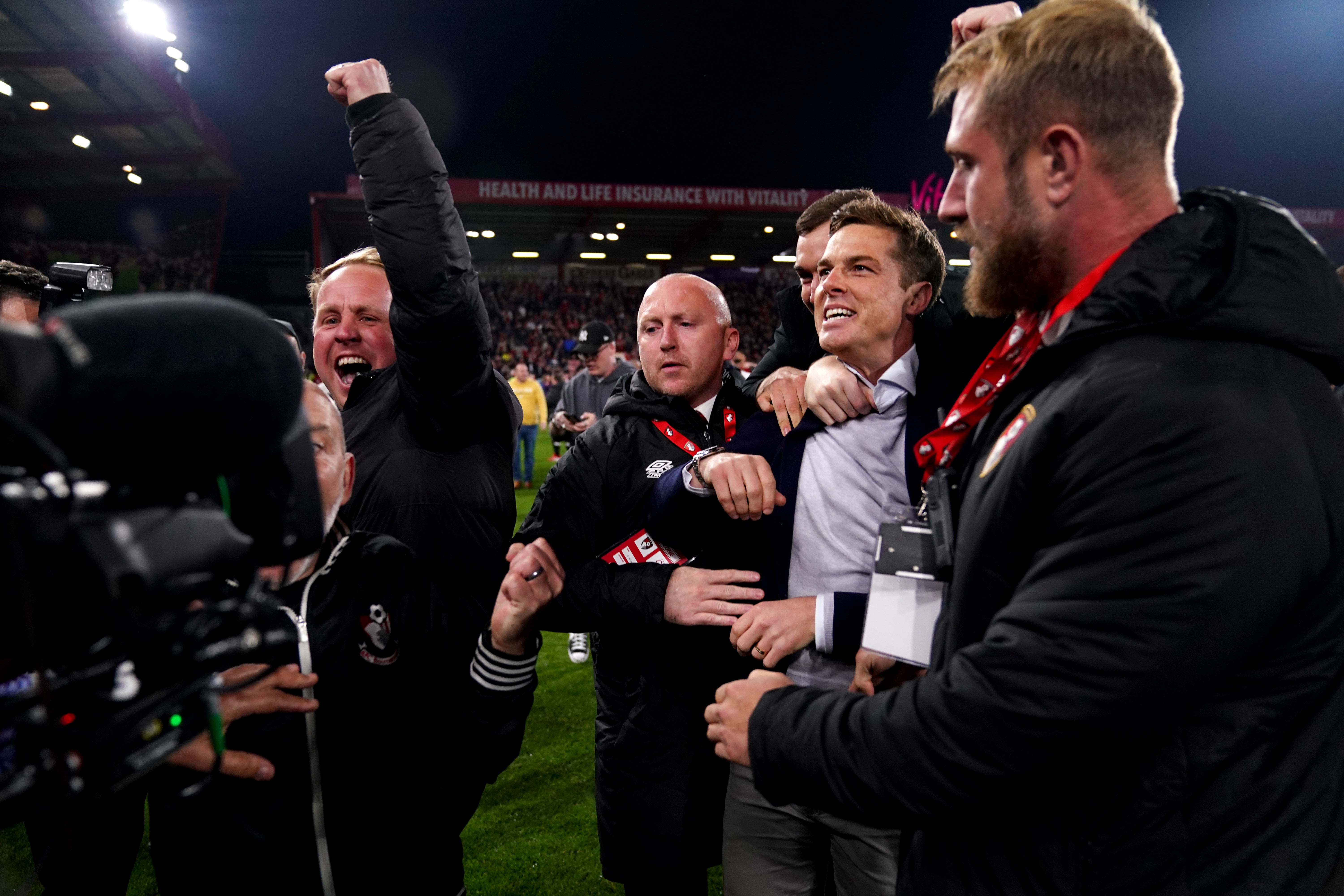 Scott Parker (second right) led Bournemouth to promotion (John Walton/PA)