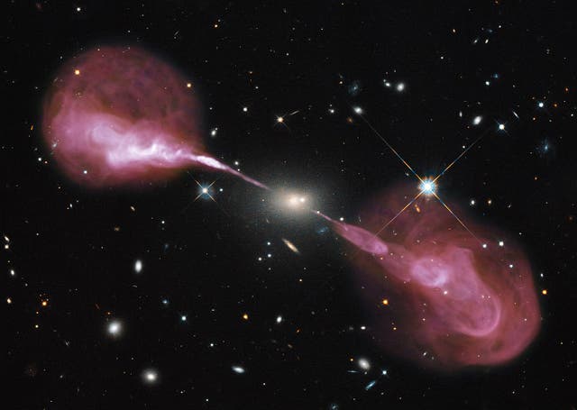 <p>A radio image shows energy streaming from the heart of radio galaxy Hercules A</p>