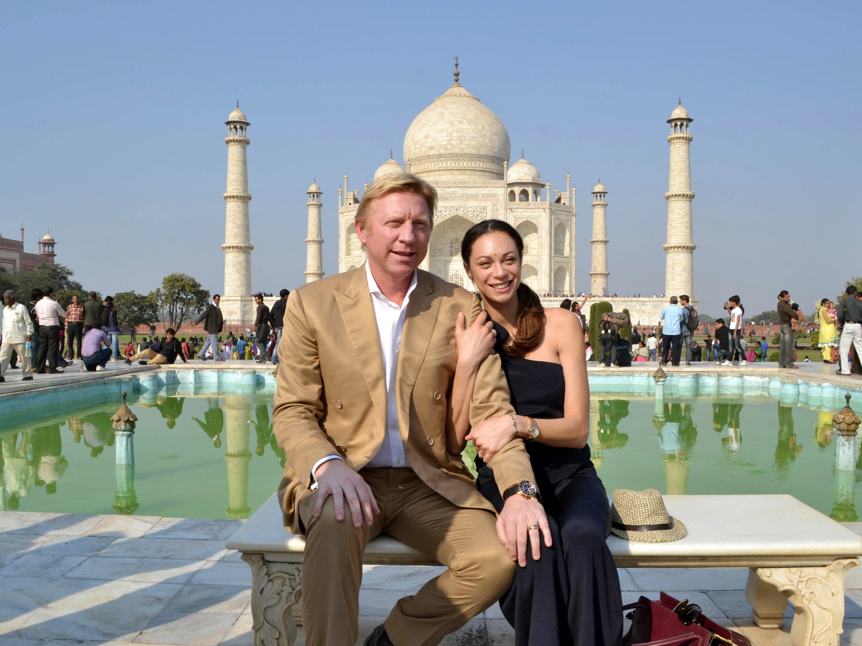 Former tennis star Boris Becker and his wife Lilly pose for a photograph in front of the Taj Mahal in 2012