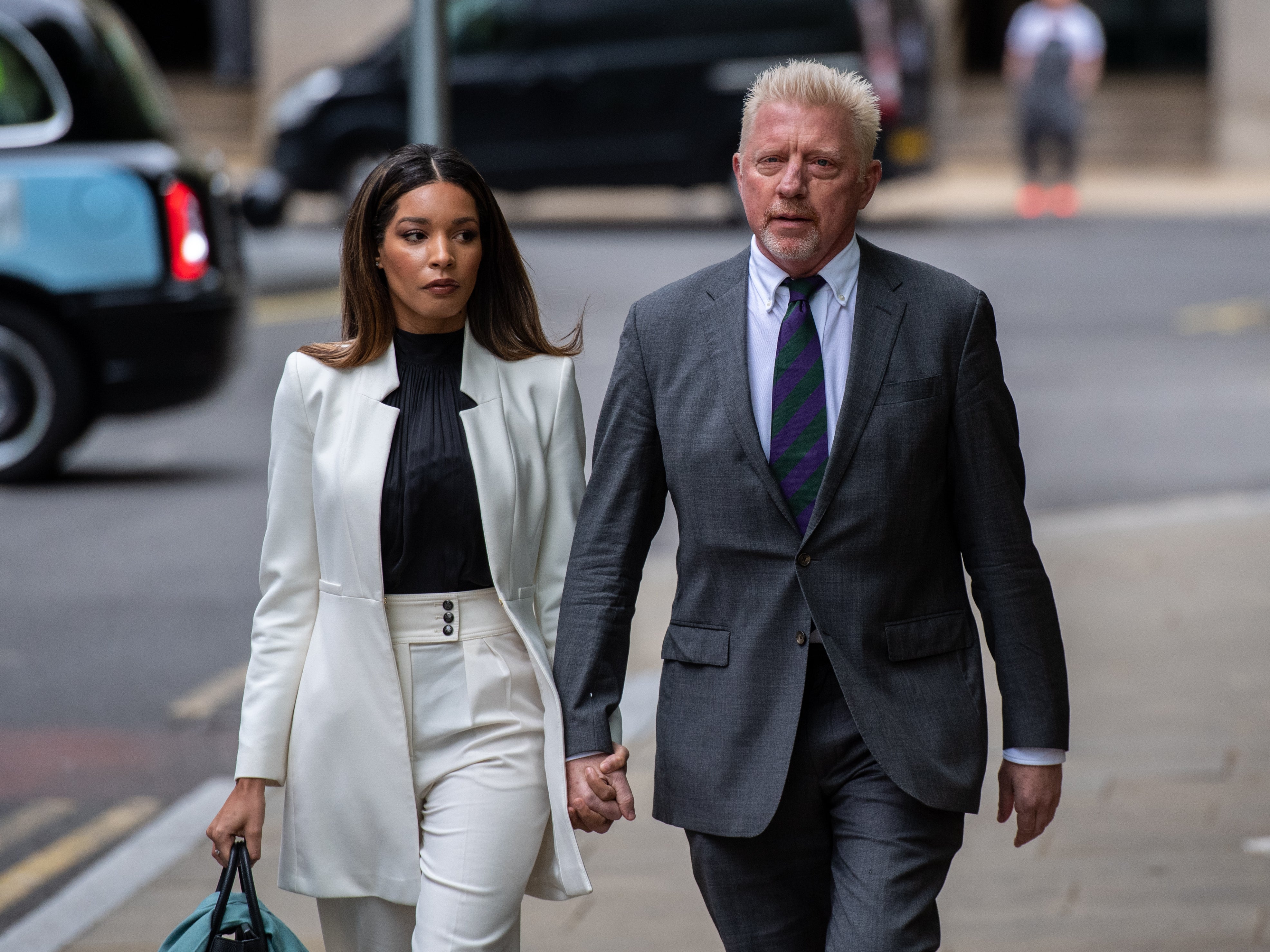 Boris Becker arriving at court with his girlfriend Lilian de Carvalho Monteiro