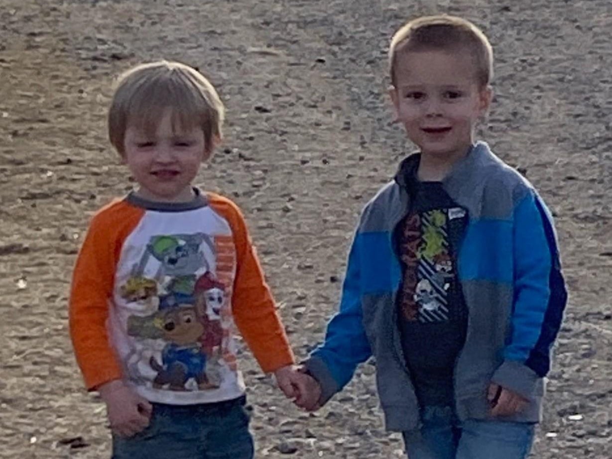 A police-issued photo of two three-year-olds, Odin Ratliff and Hunter Jackson, killed by a Utah driver