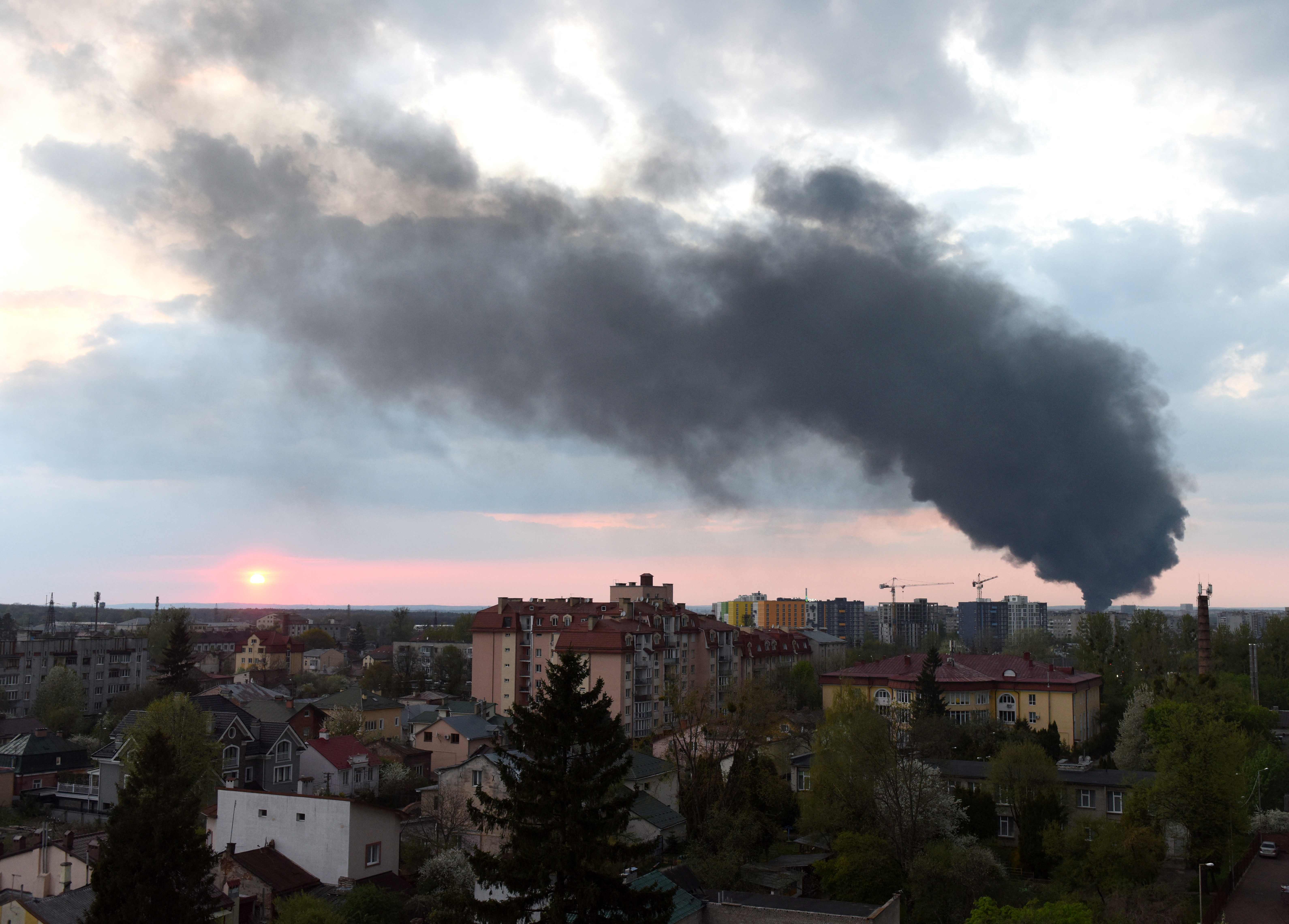 Smoke rises above the western Ukrainian city of Lviv after an air strike on 3 May, 2022