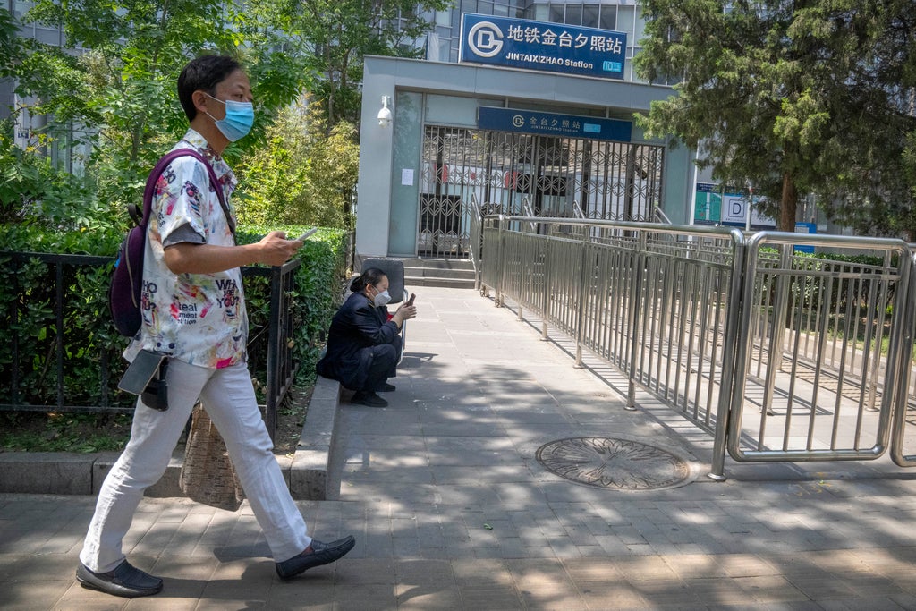 Hong Kong reopens beaches, Beijing relaxes quarantine rules