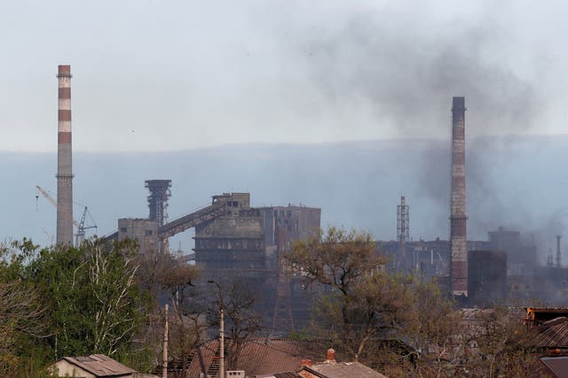 <p>Smoke rises above a plant of Azovstal Iron and Steel Works in Mariupol</p>