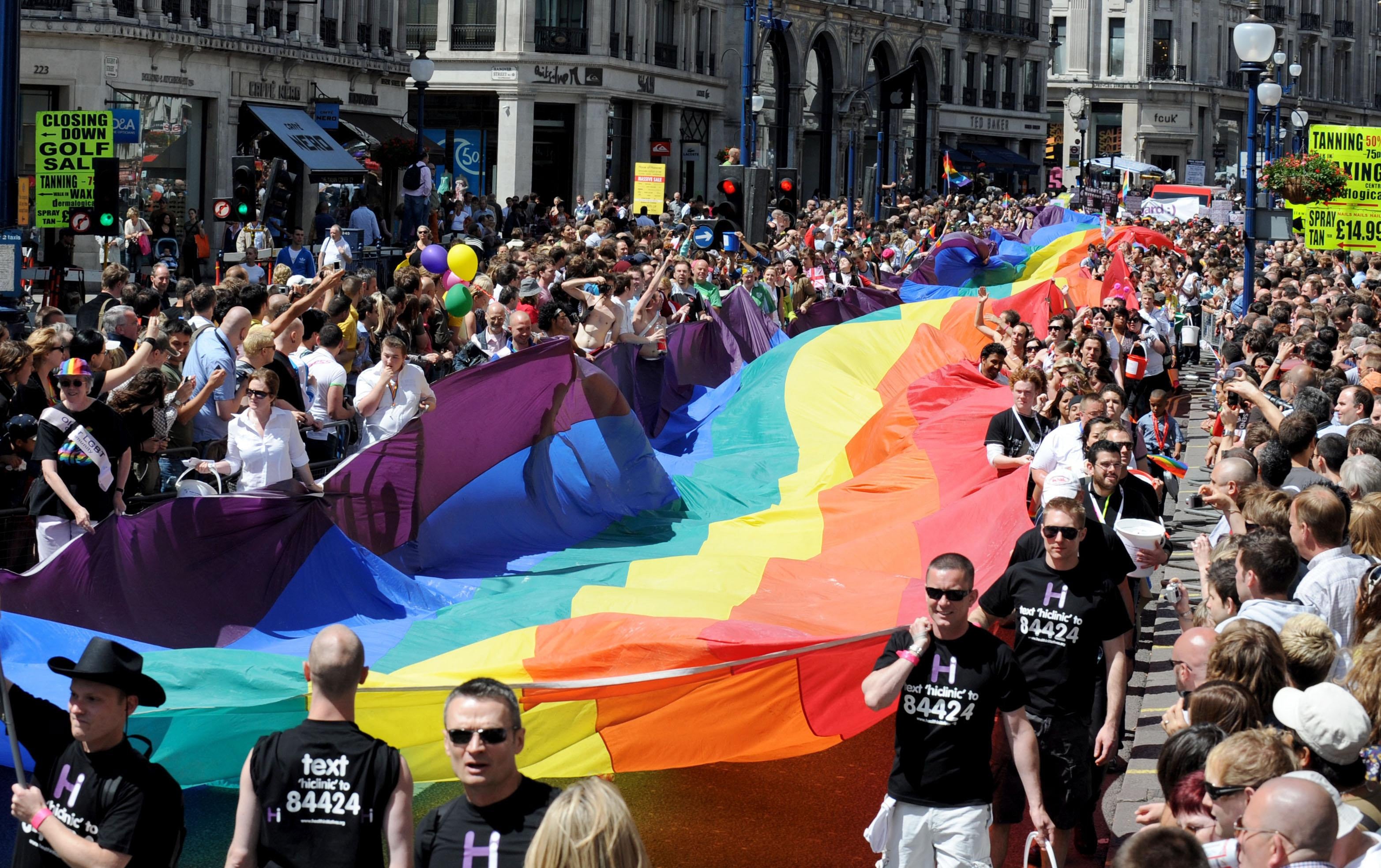 Revellers take part in the Pride London parade on Regent Street (PA)