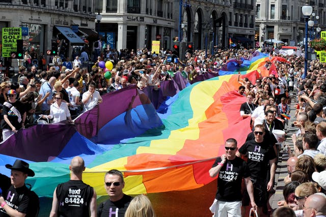 <p>Revellers take part in the Pride London parade on Regent Street (PA)</p>