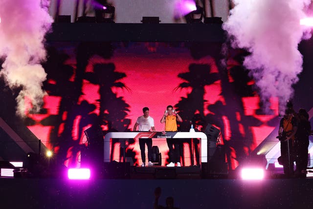 <p>Kygo and Lando Norris perform on stage in Miami</p>