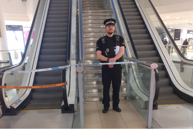 Police guard the scene at Lakeside shopping centre in Essex