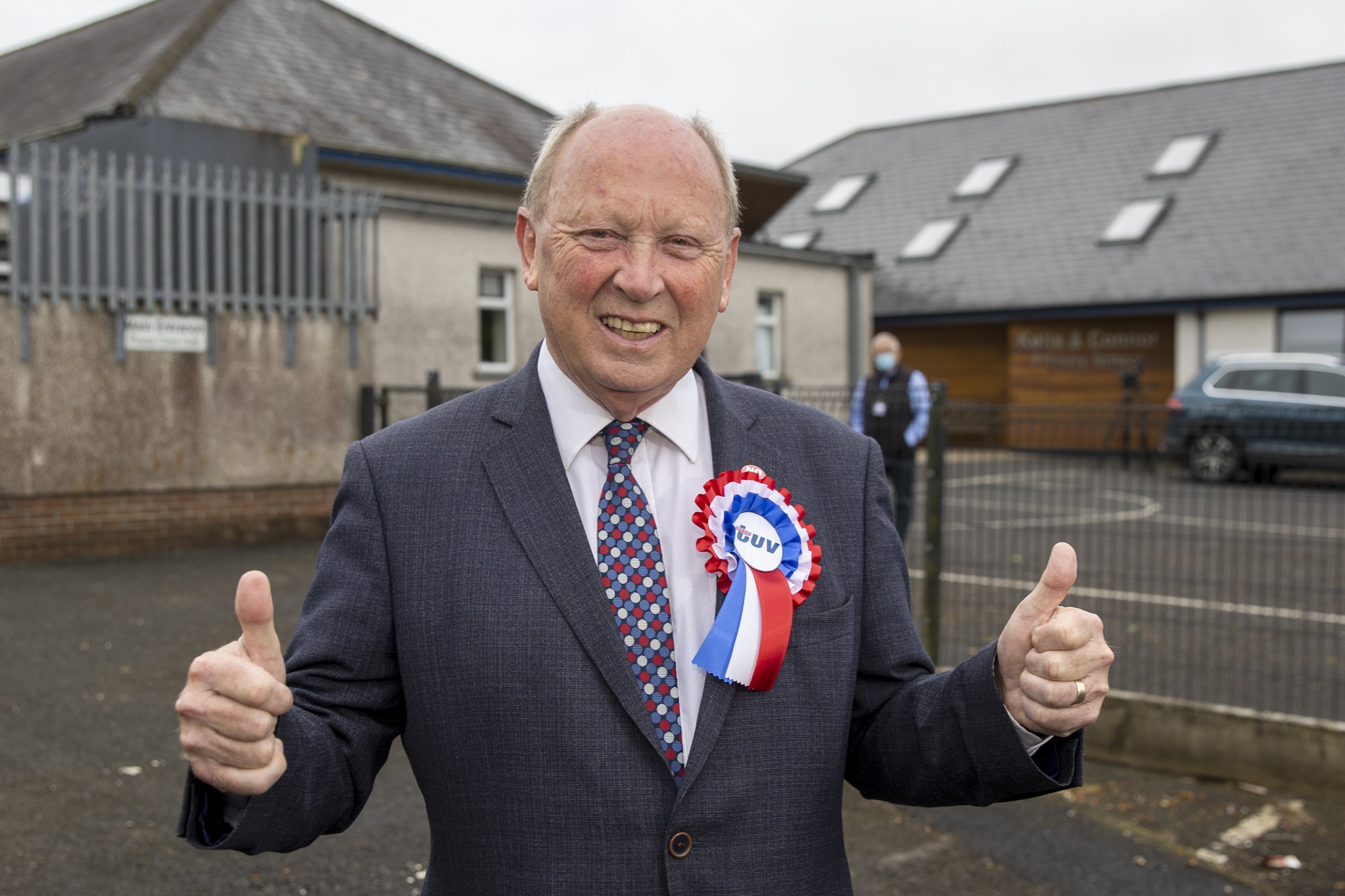 TUV leader Jim Allister give a thumbs up as he arrives at Kells and Connor Primary School, Ballymena, Antrim, to cast his vote in the 2022 NI Assembly election (Liam McBurney/PA)