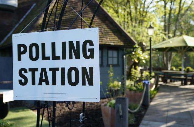 A polling station at the Crown and Cushion pub near Camberley in Surrey (Andrew Matthews/PA)