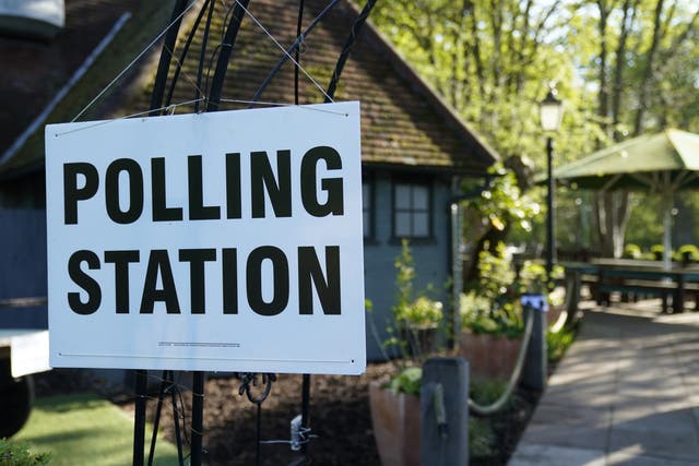 A polling station at the Crown and Cushion pub near Camberley in Surrey (Andrew Matthews/PA)