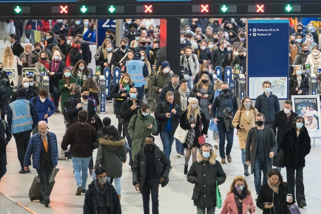 Commuters at Waterloo station, in London (Dominic Lipinski/PA)