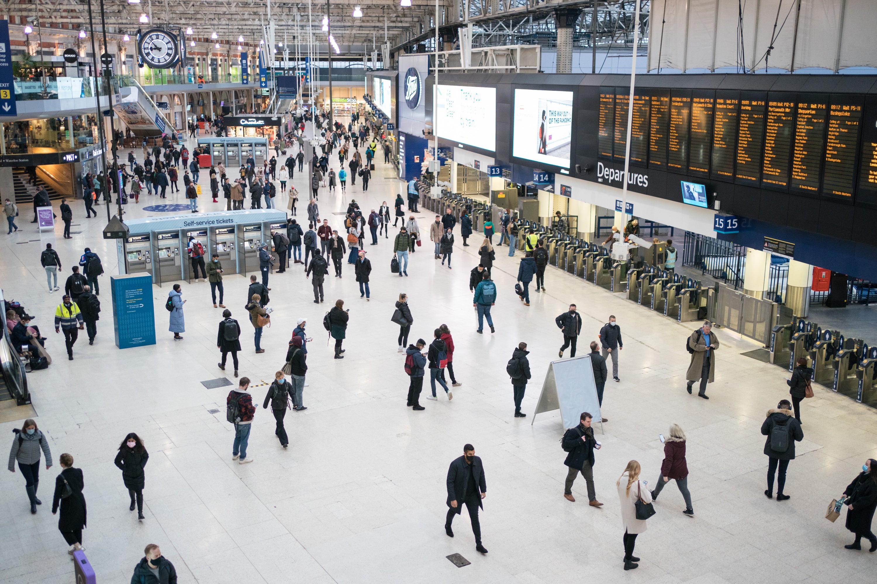 Commuters at Waterloo station, in London (Dominic Lipinski/PA)