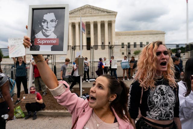 <p>Demonstrators protest outside of the US Supreme Court on Thursday, May 5, 2022, in Washington over the possible end of <em>Roe v Wade </em></p>