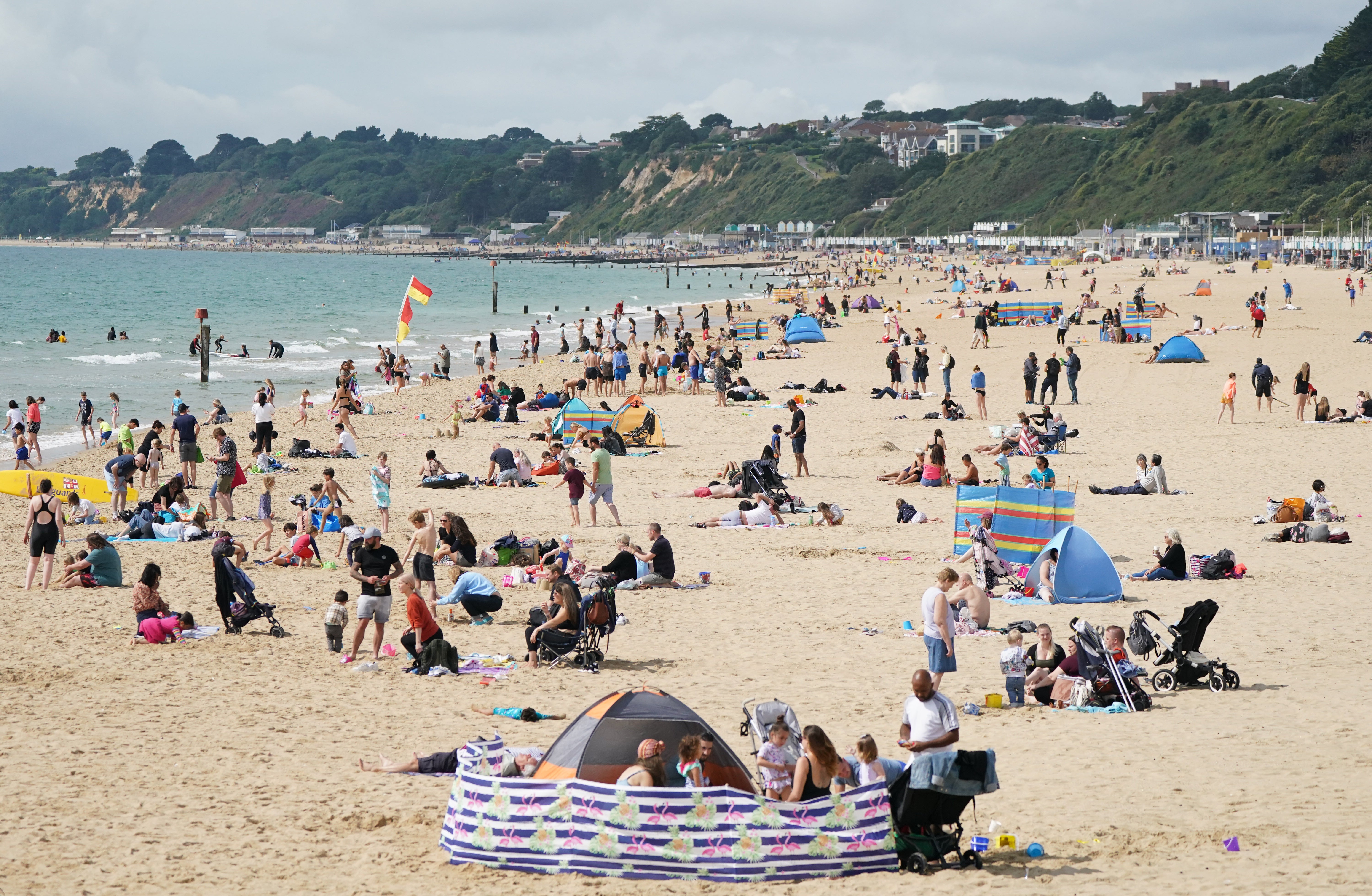 Britons have been urged to get out their sunscreen with the hottest day of the year predicted for Friday (Andrew Matthews/PA)