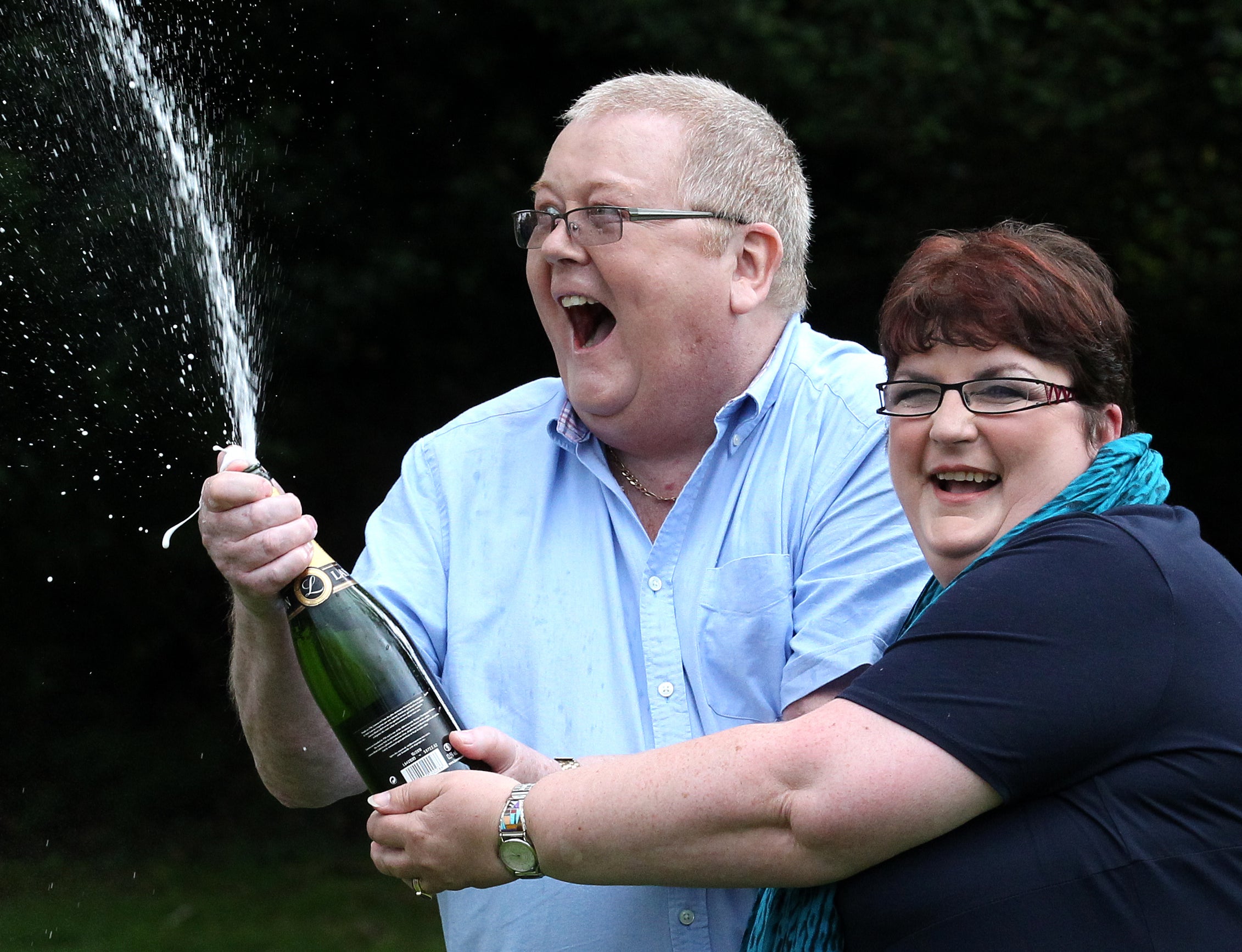 Colin and Chris Weir, from Largs in Ayrshire, celebrate after they scooped £161 million (Andrew Milligan/PA)
