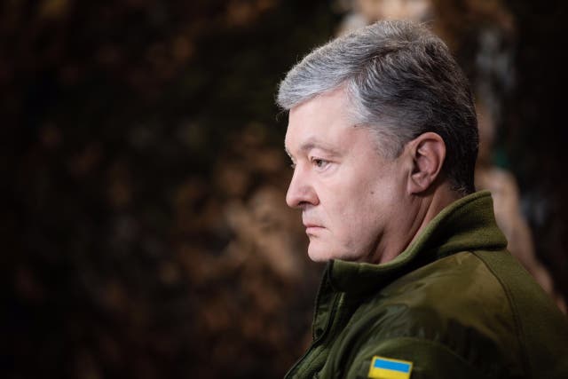 <p>Mr Poroshenko wants to see Mr Putin tried in The Hague </p>