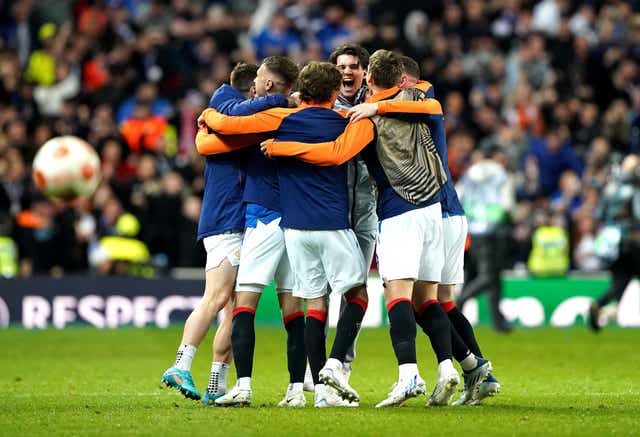 Rangers players celebrate reaching the Europa League final (Andrew Milligan/PA)