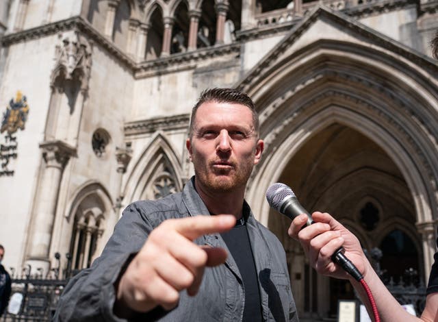 <p>Tommy Robinson after his contempt of court pre-trial hearing  </p>