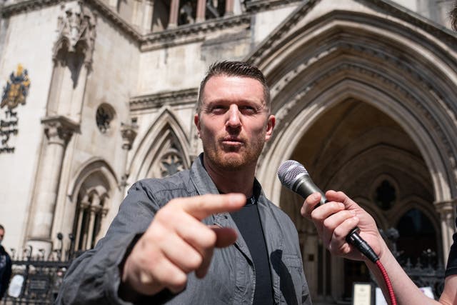 <p>Tommy Robinson after his contempt of court pre-trial hearing  </p>