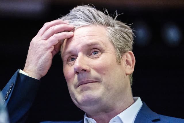 <p>Keir Starmer did not break rules when he was pictured drinking a beer and having a curry during a work meeting amid Covid lockdown </p>