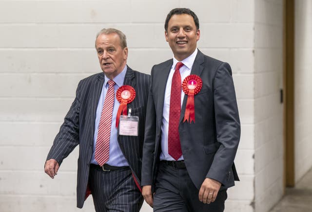 Scottish Labour leader Anas Sarwar with Malcolm Cunning (left) at the Glasgow City Council count at the Emirates Arena in Glasgow (Jane Barlow/PA)