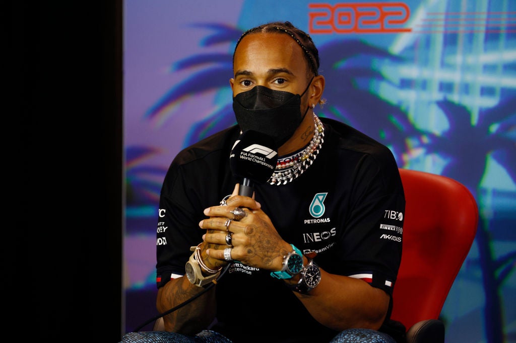 <p>Lewis Hamilton appeared at his pre-Miami press conference wearing several items of jewellery </p>