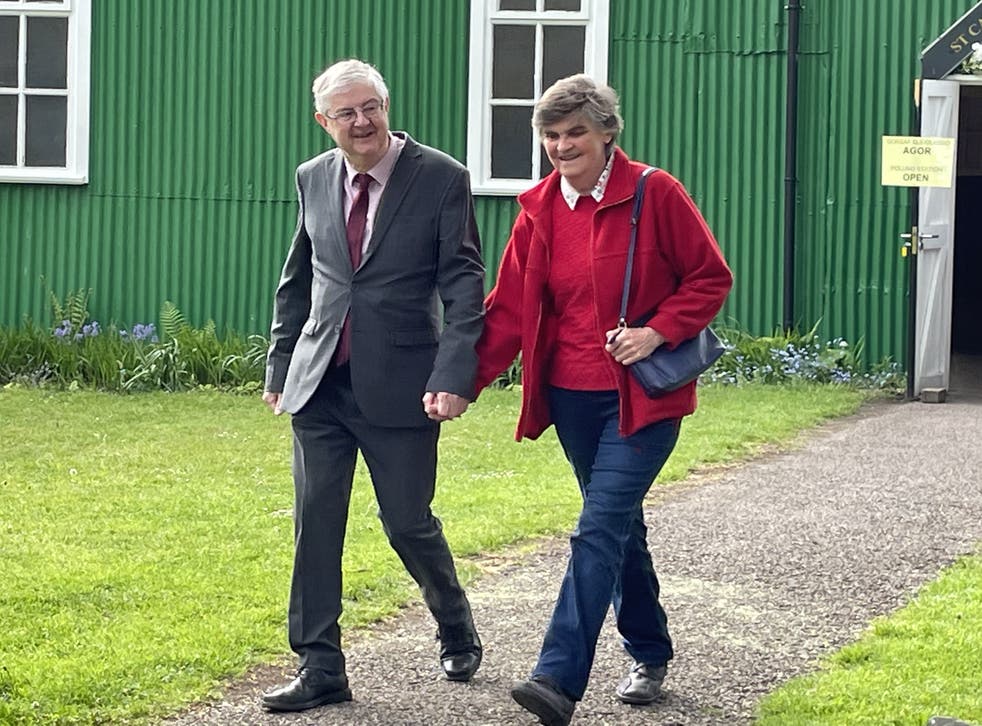 Wales’s First Minister Mark Drakeford and wife Clare after voting at St Catherine’s Hall, Pontcanna, Cardiff in the local government elections (Bronwen Weatherby/PA)
