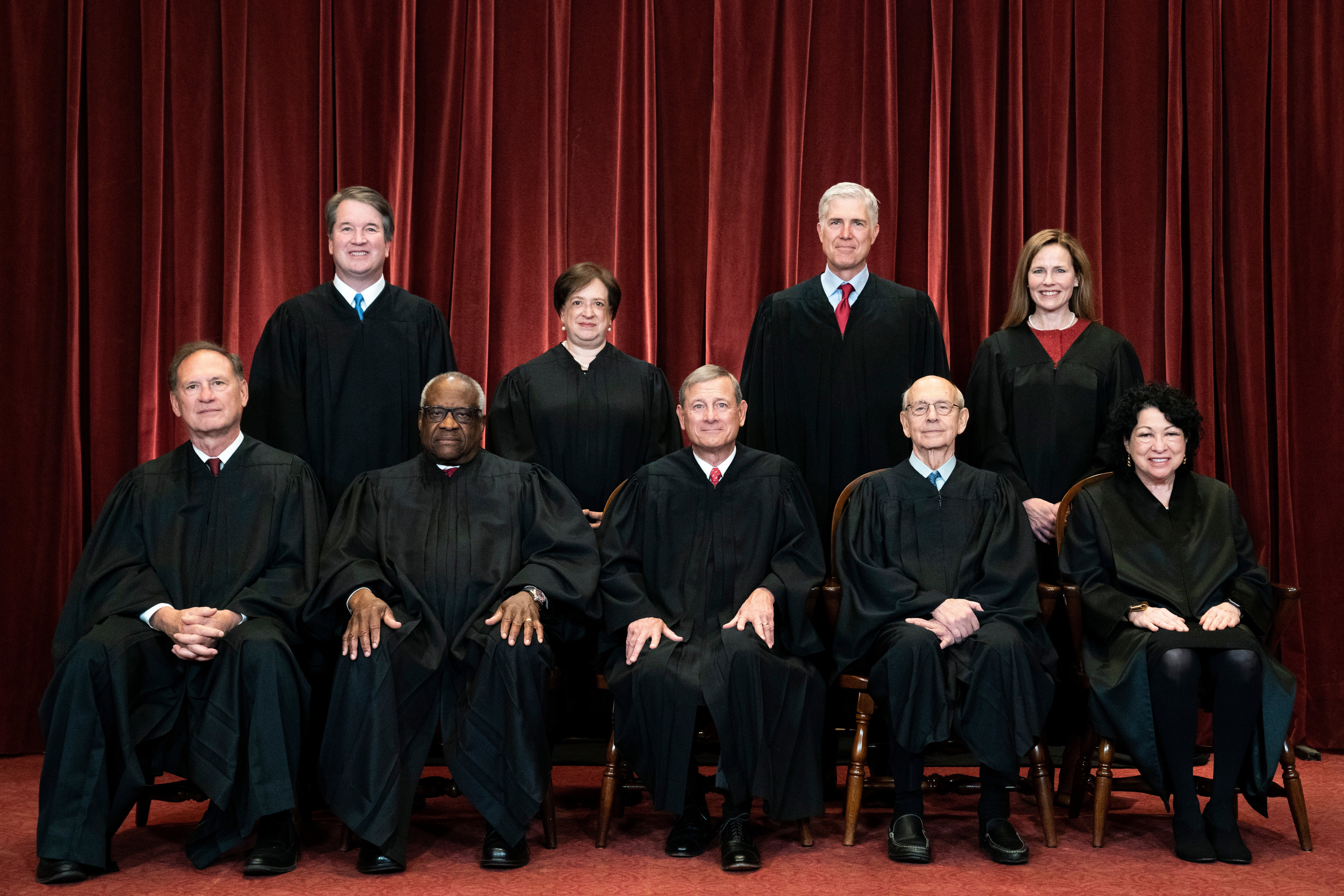 Members of the Supreme Court pose for a group photo at the Supreme Court in Washington, April 23, 2021. Seated from left are Associate Justice Samuel Alito, Associate Justice Clarence Thomas, Chief Justice John Roberts, Associate Justice Stephen Breyer and Associate Justice Sonia Sotomayor, Standing from left are Associate Justice Brett Kavanaugh, Associate Justice Elena Kagan, Associate Justice Neil Gorsuch and Associate Justice Amy Coney Barrett.