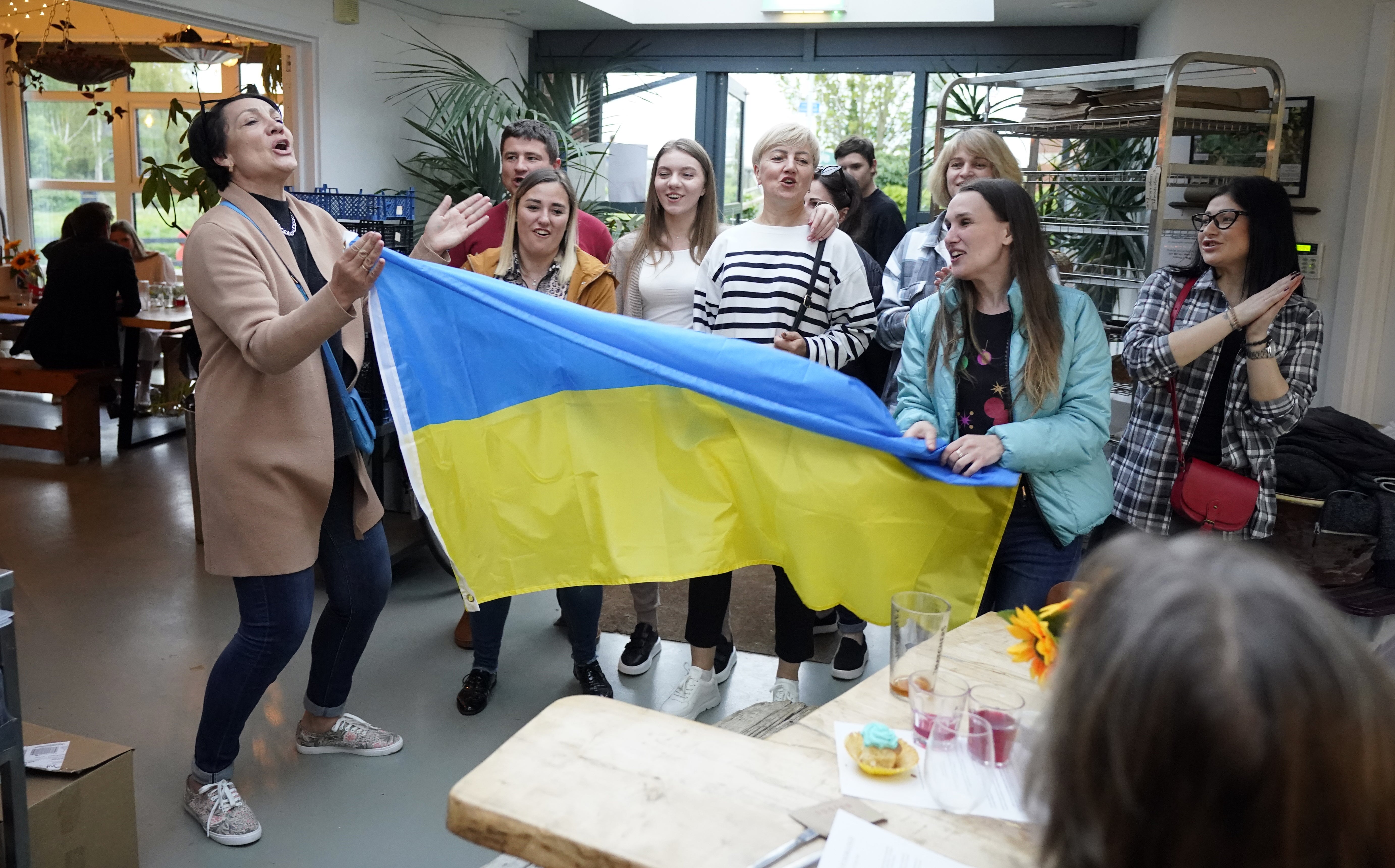 Langport’s new Ukrainian residents sang to locals after serving a three-course traditional Ukrainian supper to raise funds for The Ukrainian Red Cross Society (Andrew Matthews/PA)
