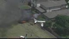 Clip shows huge smoke plumes as plane crashes into Houston backyard