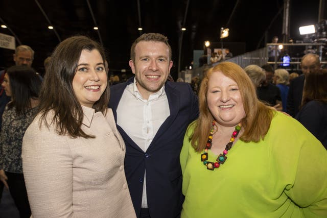 Alliance Party leader Naomi Long (right)with Belfast East party candidate Peter McReynolds and his wife Eileen McReynolds (left) at the Titanic Exhibition Centre, Belfast for the Northern Ireland Assembly Election. (Liam McBurney/PA)