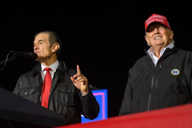 <p>Pennsylvania Republican U.S. Senate candidate Dr Mehmet Oz joins former President Donald Trump onstage during a rally in support of his campaign at the Westmoreland County Fairgrounds on May 6</p>