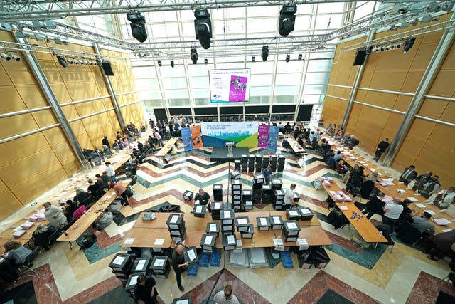 Votes being counted at the Tower Hamlets Council count at Canary Wharf (Aaron Chown/PA)