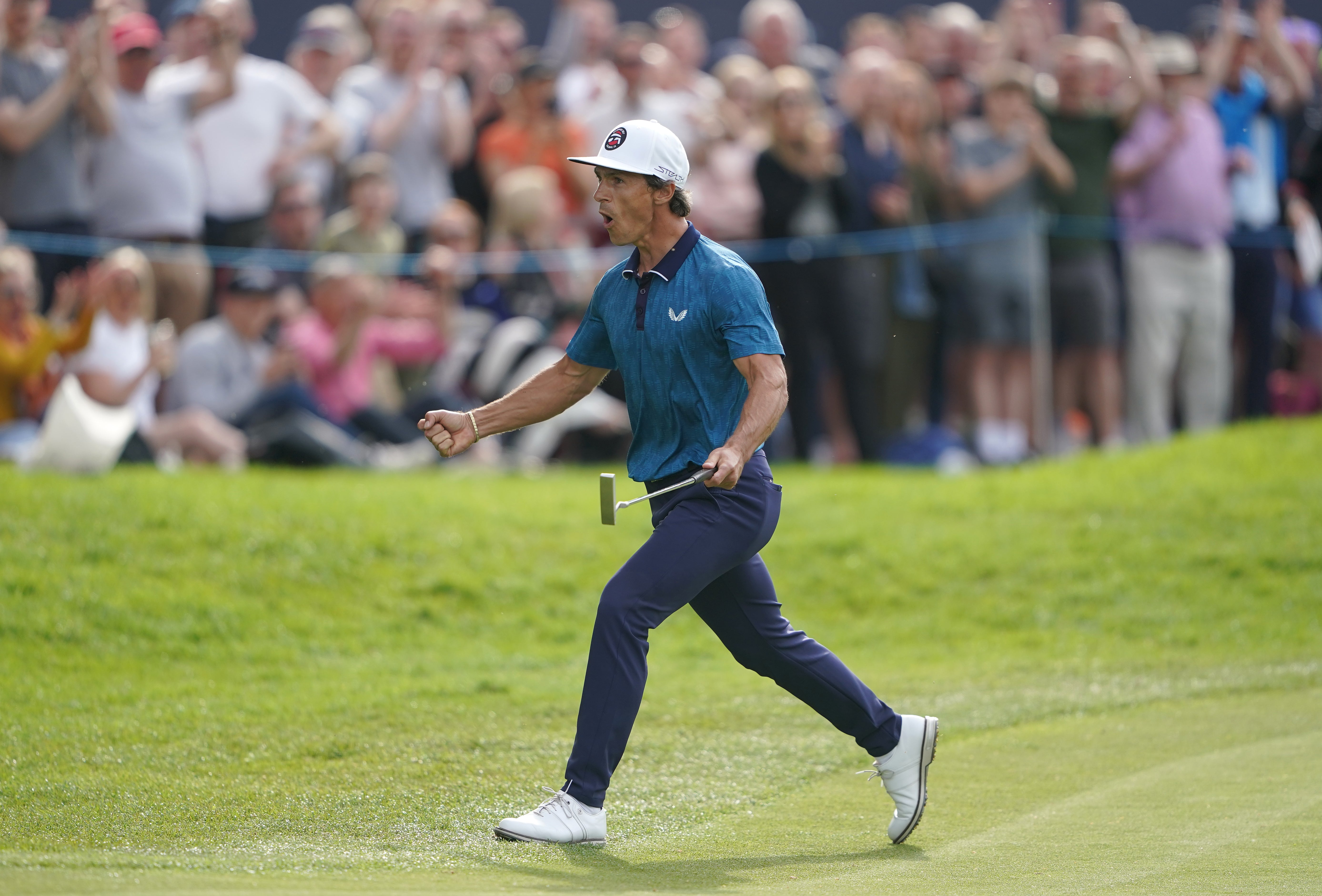 Denmark’s Thorbjorn Olesen celebrates winning with a birdie putt on the 18th hole in the final round of the Betfred British Masters (Zac Goodwin/PA)