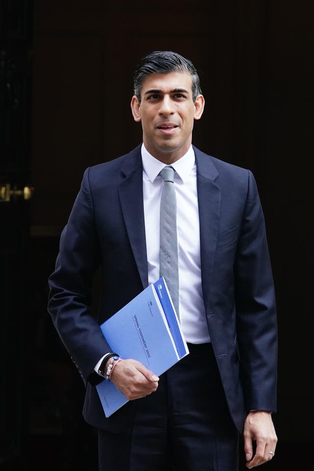 The sanctions, outlined by the International Trade Secretary Anne-Marie Trevelyan and Chancellor Rishi Sunak, pictured, involve import tariffs and export bans (PA)