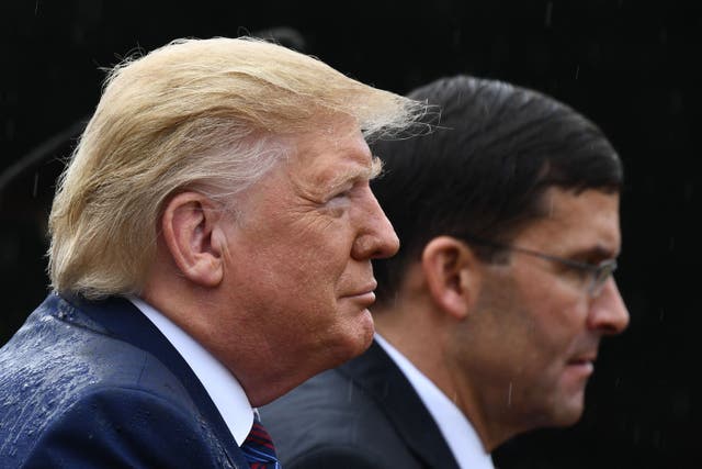 <p>Donald Trump and former Secretary of Defense Mark Esper attend the Armed Forces Welcome Ceremony in honor of the Twentieth Chairman of the Joint Chiefs of Staff at Summerall Field, Joint Base Myer-Henderson Hall, Virginia</p>