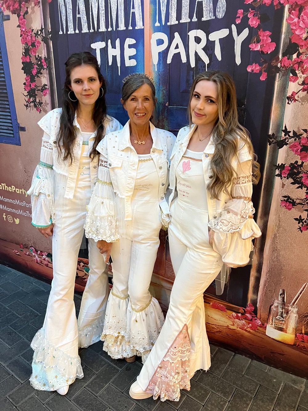 Jane and her daughters at a Mamma Mia party (Collect/PA Real Life).