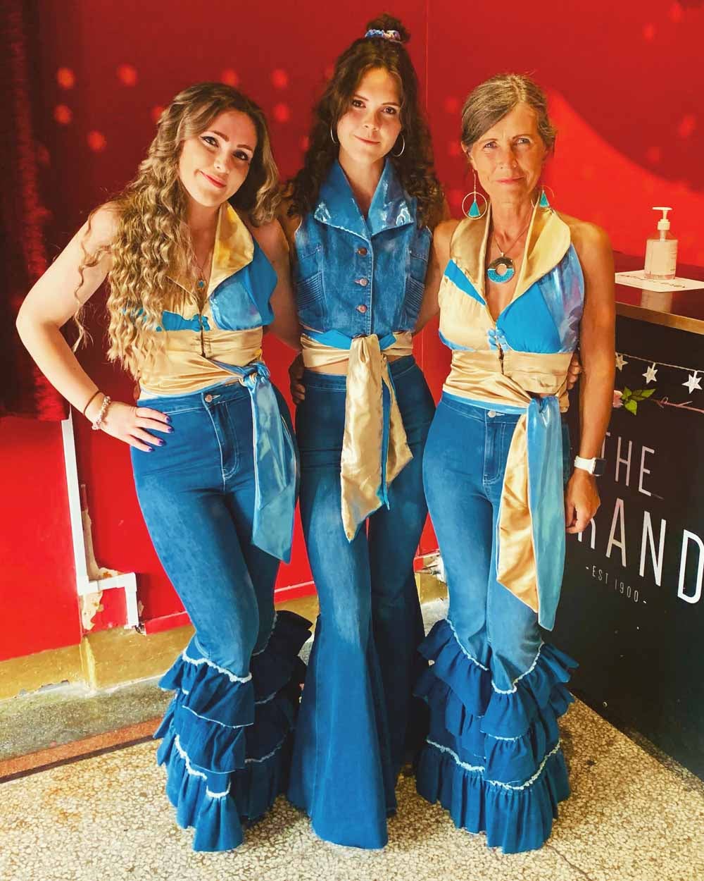 Jane and her two daughters, Lucy and Chloe, love dressing up for ABBA events (Collect/PA Real Life).