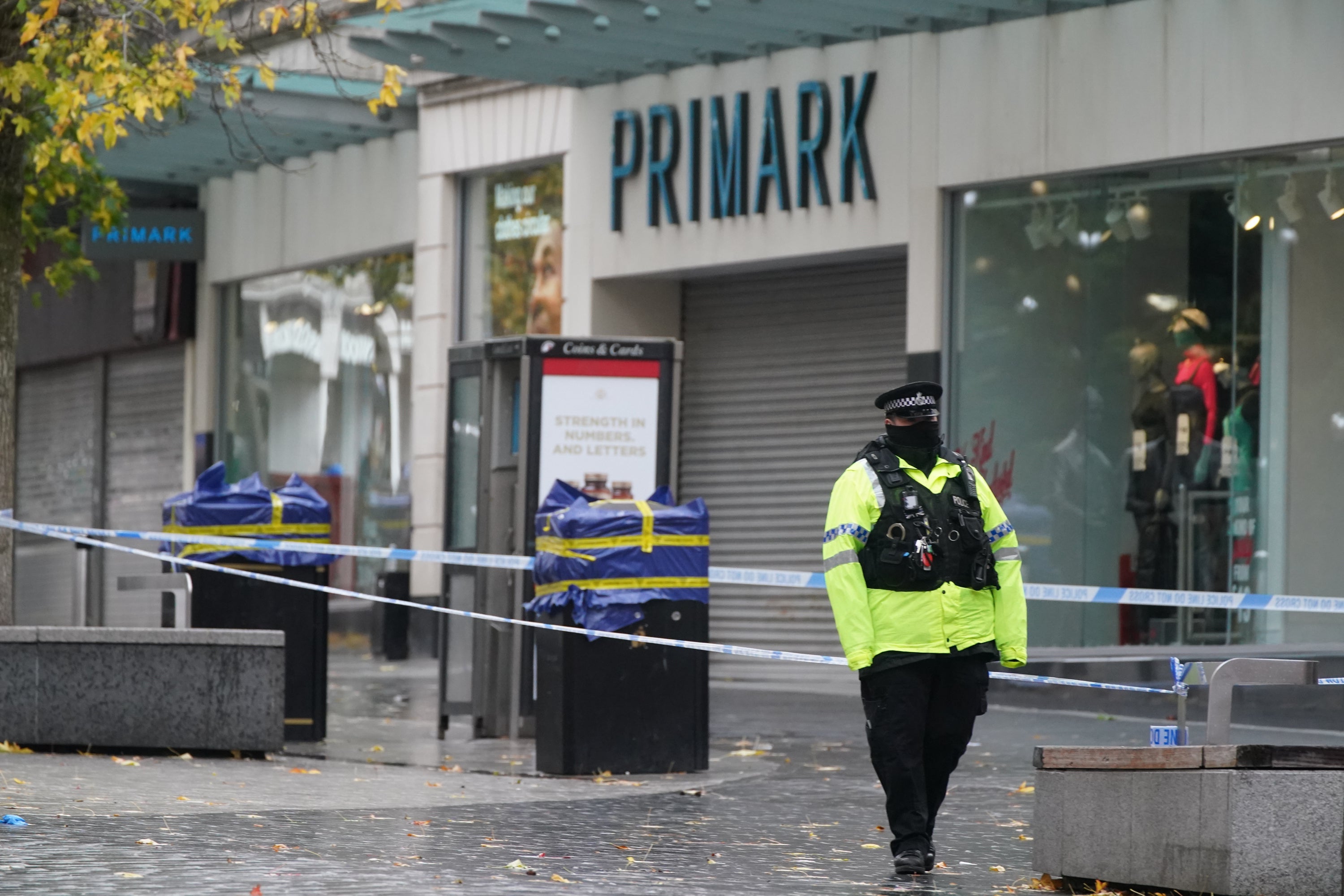 Police near the scene of the stabbing (Peter Byrne/PA)