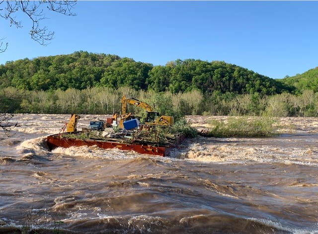 <p>One of the barges is seen stuck in the Potomac River </p>