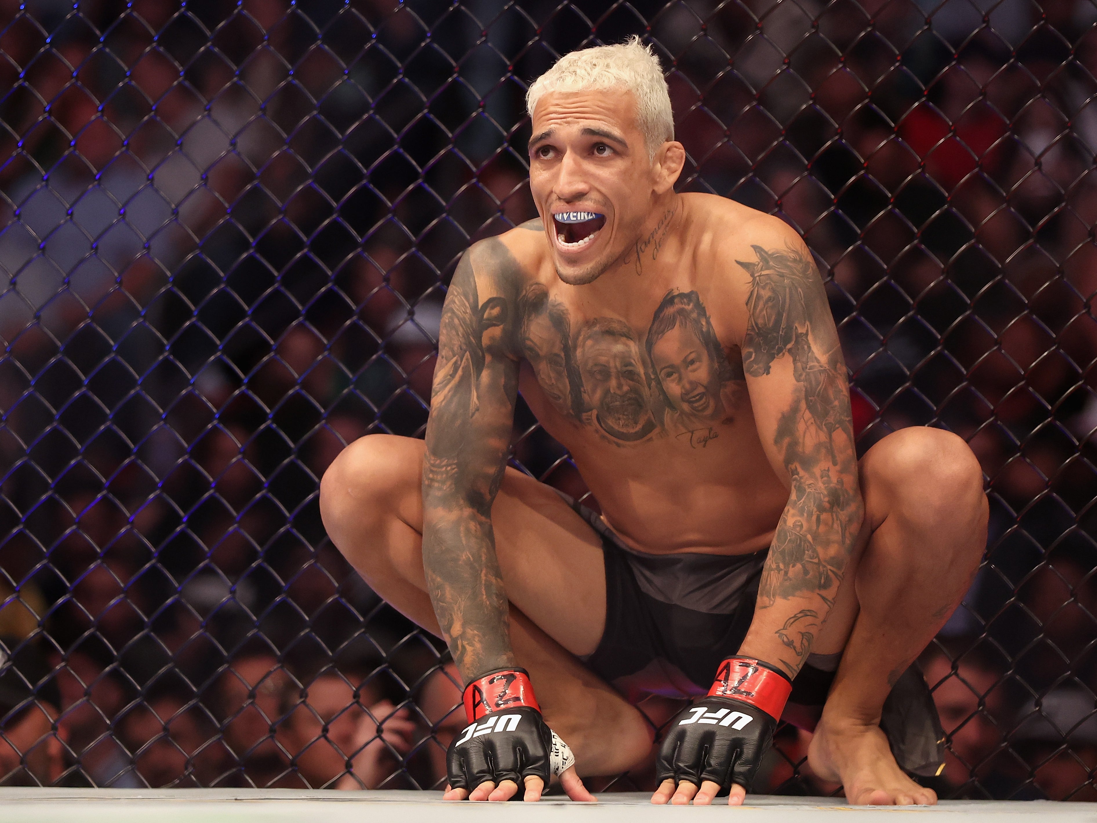 <p>Charles Oliveira was stripped of the UFC lightweight belt before submitting Justin Gaethje</p>
