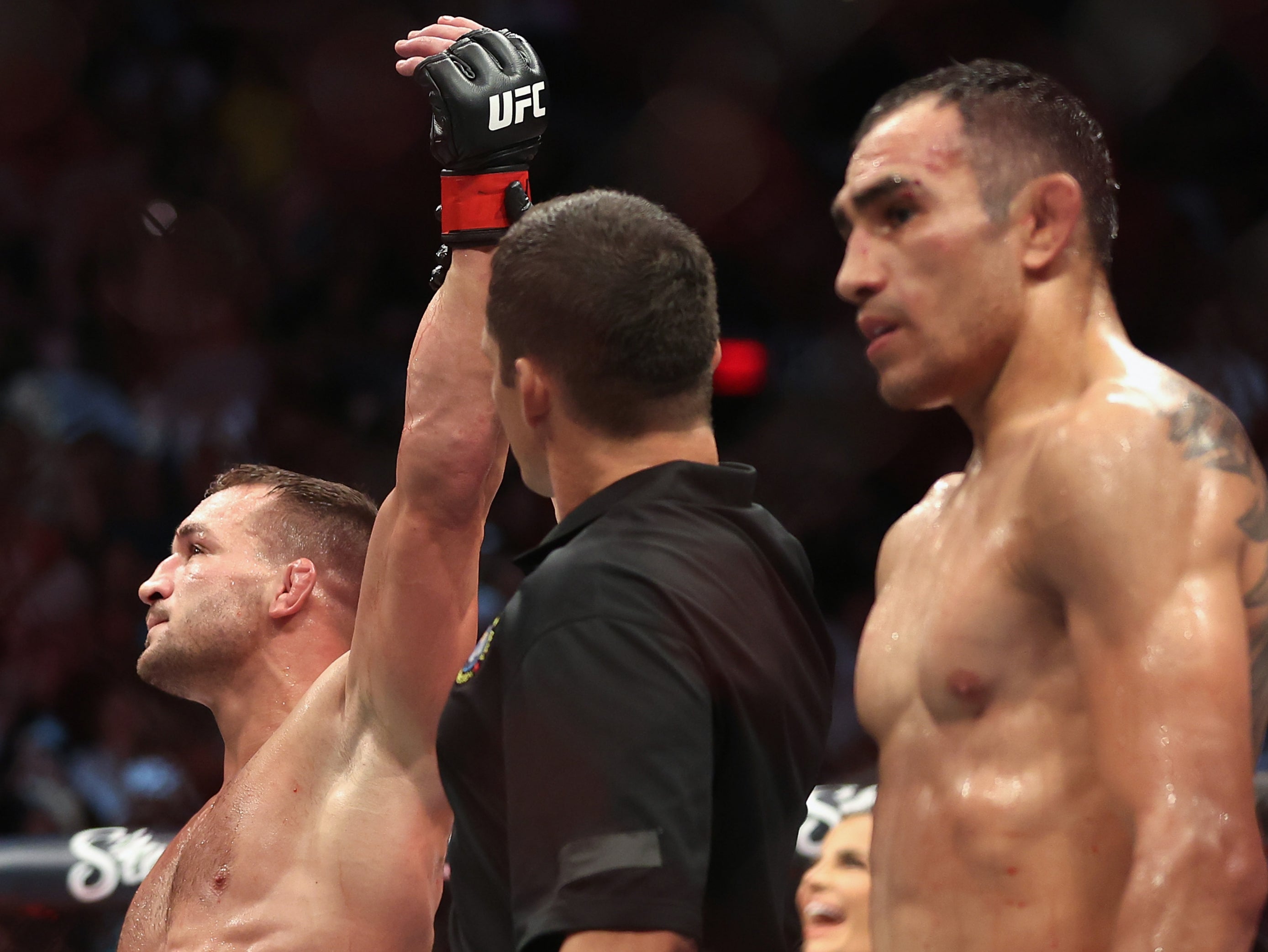 Tony Ferguson (right) seems determined to keep fighting and get back in the win column