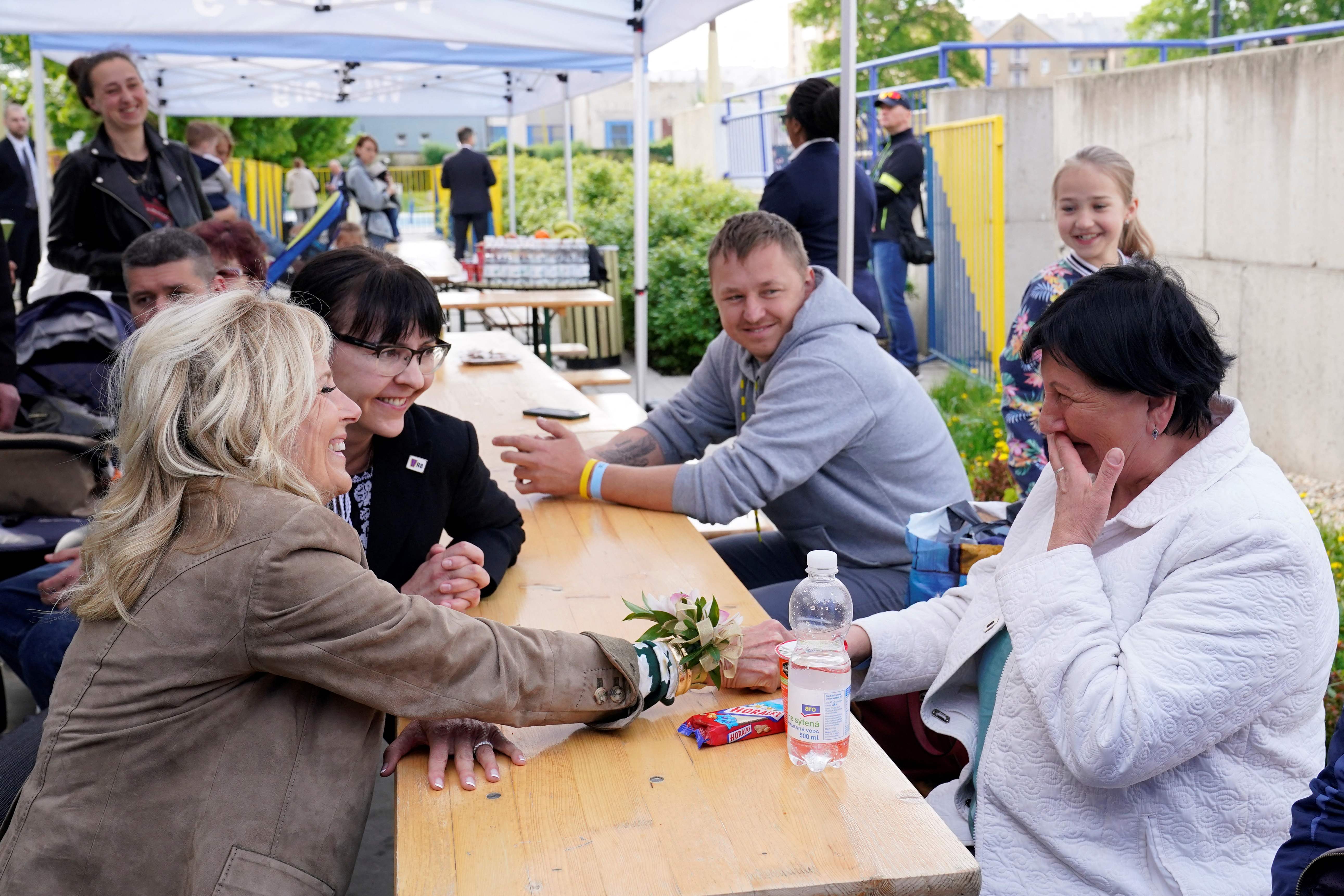 US First Lady Jill Biden (L) speaks with Ukrainian refugees at a city-run refugee center in Kosice, Slovakia