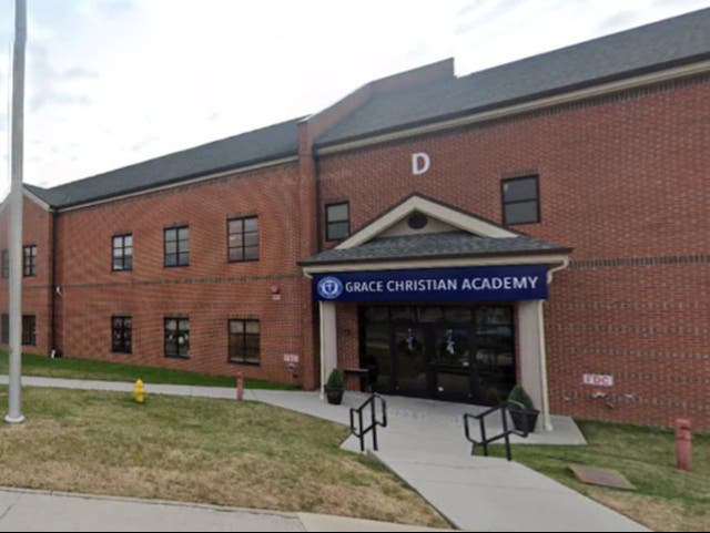 <p>A student at the Grace Christian Academy in Knoxville, Tennessee was seen in a video wearing a KKK-style hood</p>