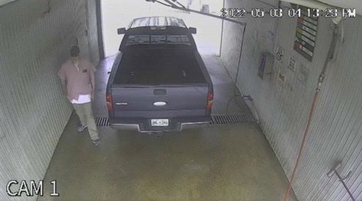 Casey White is spotted on surveillance footage at a car wash in Indiana