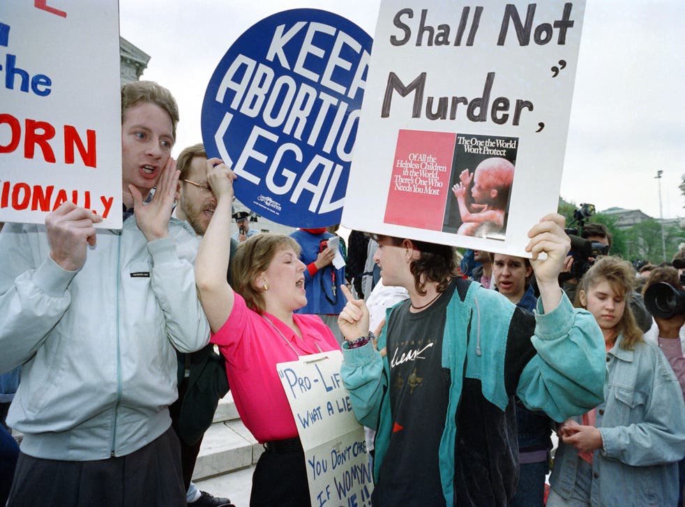 <p>Anti-abortion demonstrations and abortion rights proponents  protest at a protest in 1989. </p>
